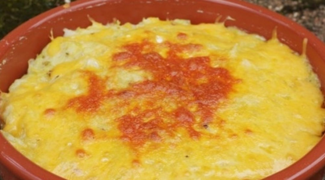 Clapshot covered with cheese